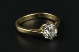 A DIAMOND SINGLE STONE RING, the round brilliant-cut diamond in eight claw setting, 18ct two