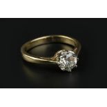 A DIAMOND SINGLE STONE RING, the round brilliant-cut diamond in eight claw setting, 18ct two