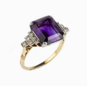 AN AMETHYST AND DIAMOND DRESS RING, the rectangular step-cut amethyst claw set between stepped