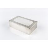A SILVER RECTANGULAR CIGARETTE BOX, with engine turned top, by Mappin & Webb, Birmingham 1965, 15.
