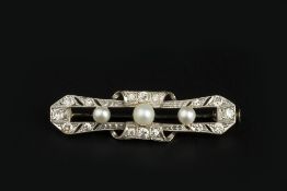 A CULTURED PEARL AND DIAMOND PANEL BROOCH, the slightly tapered openwork panel centred with a trio