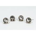 A SET OF FOUR SILVER NOVELTY MENU HOLDERS each modelled with a different game bird, on oval base, by