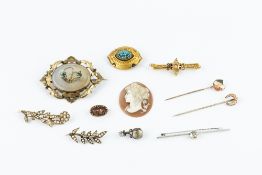 A COLLECTION OF VICTORIAN AND LATER JEWELLERY, comprising a turquoise set panel brooch, applied with
