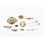 A COLLECTION OF VICTORIAN AND LATER JEWELLERY, comprising a turquoise set panel brooch, applied with