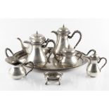 AN ITALIAN SILVER SIX PIECE TEA SERVICE, with baluster bodies and twist handles, comprising