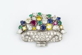 A DIAMOND AND GEM SET GIARDINETTO BROOCH, designed as a pierced and millegrained vase, pavé set with