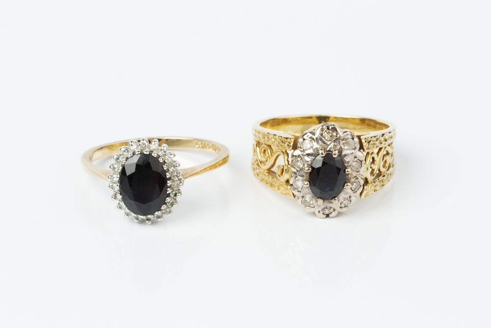 TWO SAPPHIRE AND DIAMOND CLUSTER RINGS, the first centred with an oval mixed-cut sapphire and - Image 2 of 3