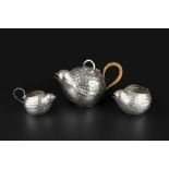 A LATE VICTORIAN SILVER PLATED NOVELTY THREE-PIECE TEA SERVICE, each piece modelled as a quail