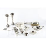 A COLLECTION OF SILVER, comprising an Edwardian pierce decorated sweetmeat basket, Chester 1904,