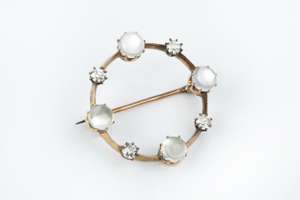 A MOONSTONE AND DIAMOND CIRCLET BROOCH, alternately set with old-cut diamonds and circular moonstone - Image 3 of 4