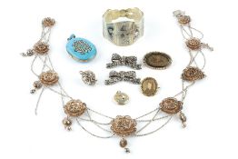 A COLLECTION OF ANTIQUE AND LATER JEWELLERY, comprising a white metal filigree panel necklace, a