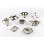 A COLLECTION OF SILVER comprising a twin handled bowl, Birmingham 1946, a christening mug, a sauce