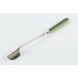 A GEORGE III SILVER STILTON SCOOP, with plain, rounded green stained ivory handle, maker's mark