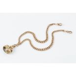 A 9CT GOLD ALBERT CHAIN WITH HARDSTONE SEAL FOB, the graduated curb-link chain with swivel clasps,
