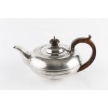 A SILVER TEAPOT, of compressed girdled form, with hardwood handle and knop, by C.J. Vander Ltd,