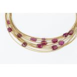 A TOURMALINE MULTI-STRAND NECKLACE BY MARCO BICEGO, comprising fourteen snake-link strands,