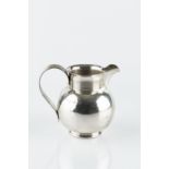 AN EDWARDIAN SILVER MILK JUG, of globular form with reeded strap handle and border, by Marston &
