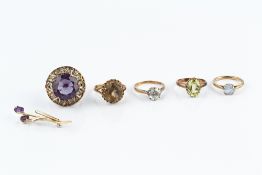 A COLLECTION OF JEWELLERY, comprising two single stone dress rings, 9ct gold mounted, three