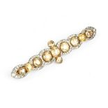 A DIAMOND AND GEM SET BAR BROOCH, designed as a line of circular mixed-cut brown zircons and