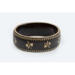 A COLLECTION OF ANTIQUE AND LATER JEWELLERY, comprising a tortoiseshell piqué work bangle, of hinged