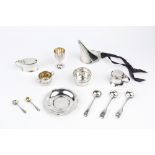 A SMALL COLLECTION OF SILVER, comprising a twin handled salt, London 1888, two mustards, a flared