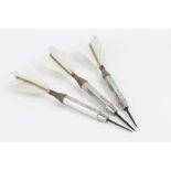 A SET OF THREE SILVER MOUNTED DARTS, with faceted grips, and feather flights, by Adie Bros Ltd,