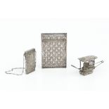 A CHINESE EXPORT SILVER FILIGREE CARD CASE, with a repeated scroll and stylised flowerhead design,