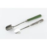 A GEORGE IV SILVER STILTON SCOOP, with reeded angular green stained ivory handle, by Aaron Hadfield,