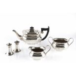 A SILVER THREE PIECE TEA SERVICE, the teapot with ebonised handle and knop, by Viners Ltd, Sheffield
