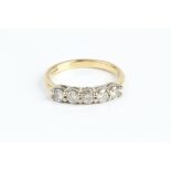 A DIAMOND FIVE STONE RING, the line of uniform round brilliant-cut diamonds in claw settings, 18ct