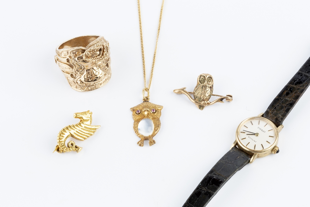 A COLLECTION OF JEWELLERY, comprising a moonstone and ruby set owl pendant, stamped '750', on a