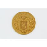 OF GOLFING INTEREST: A FRENCH MEDAL, depicting the coat of arms for Cannes, inscribed 'Prix Offert