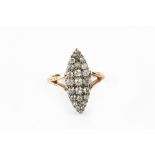 A DIAMOND PANEL RING, the navette-shaped panel of old, single and round brilliant-cut diamonds in