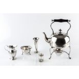 A SMALL COLLECTION OF SILVER, comprising a baluster cream jug, Birmingham 1908, a sugar basin, a