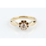 A DIAMOND SINGLE STONE RING, the old brilliant-cut diamond in eight claw setting, yellow precious