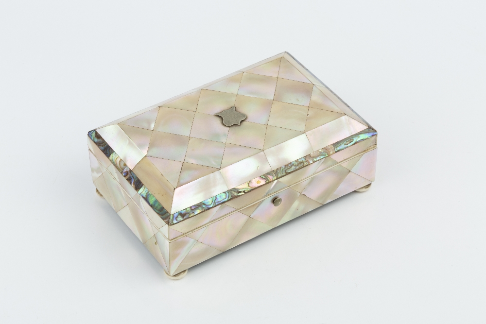 A 19TH CENTURY FRENCH MOTHER OF PEARL RECTANGULAR NECESSAIRE, containing a range of silver gilt - Image 2 of 4