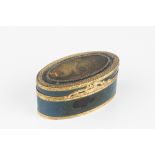 A LATE 18TH CENTURY FRENCH GOLD MOUNTED TORTOISESHELL OVAL BOX, the hinged cover mounted with a