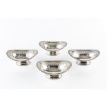 A SET OF FOUR SILVER PLATED OVAL SWEETMEAT BASKETS, with gadrooned borders, and pierced and engraved