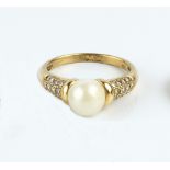 A CULTURED PEARL AND DIAMOND DRESS RING BY MAPPIN & WEBB, the cultured pearl measuring approximately