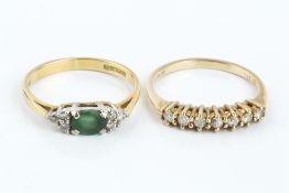 TWO DIAMOND SET RINGS, the first an emerald and diamond dress ring, 18ct gold mounted, the second