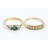 TWO DIAMOND SET RINGS, the first an emerald and diamond dress ring, 18ct gold mounted, the second