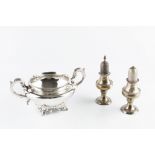 AN EARLY VICTORIAN SILVER TWIN HANDLED SUCRIER, with leaf capped scroll handles and foliate scroll