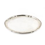 A DUTCH SILVER TEA TRAY, of shaped oval form, with reeded border, stamped 'Begeer' and with
