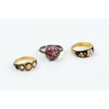 TWO HALF PEARL AND ENAMEL MEMORIAL RINGS, the first an Edwardian tapered band, applied with a floral