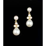 A PAIR OF CULTURED PEARL AND DIAMOND EAR PENDANTS, each pear-shaped cultured pearl drop surmounted
