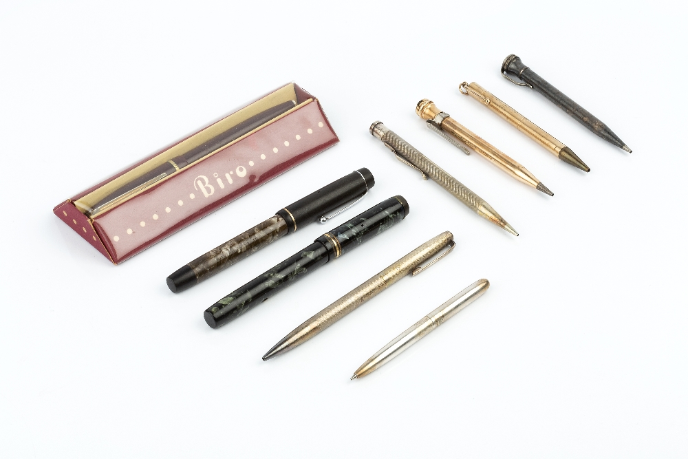 A 9CT GOLD CASED 'BAKER'S POINTER PENCIL', a gold plated pencil, two silver 'Yard-o-Led' pencils,