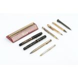 A 9CT GOLD CASED 'BAKER'S POINTER PENCIL', a gold plated pencil, two silver 'Yard-o-Led' pencils,