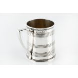 A GEORGE III SILVER CHRISTENING MUG, with bands of reeded decoration, and angular handle, by Rebecca