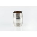 A GEORGE III SILVER BARREL FORM BEAKER, with bands of reeded decoration and silver gilt interior, by