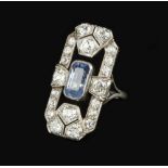 AN ART DECO SAPPHIRE AND DIAMOND PANEL RING, the elongated shaped rectangular panel of openwork